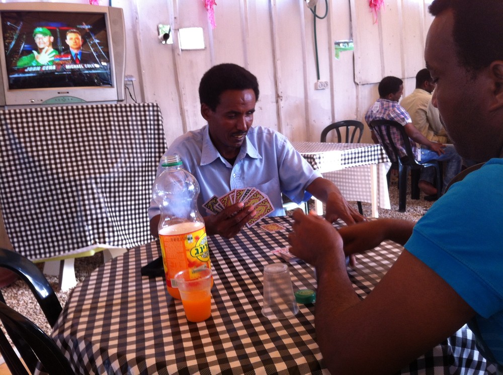 groups of Eritreans
play cards