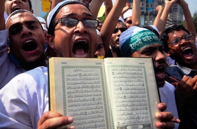 Muslim with Koran