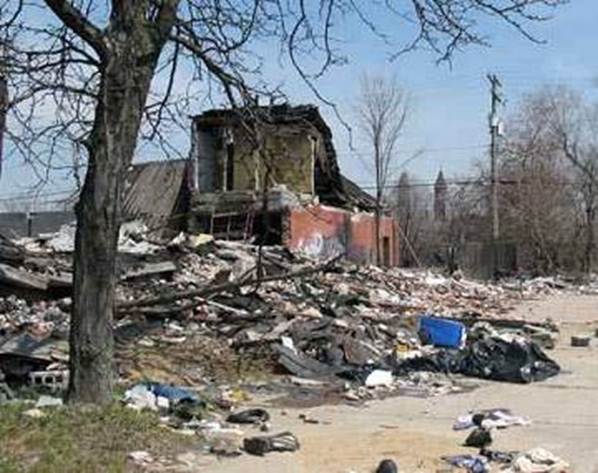  Detroit. ruined house and trash