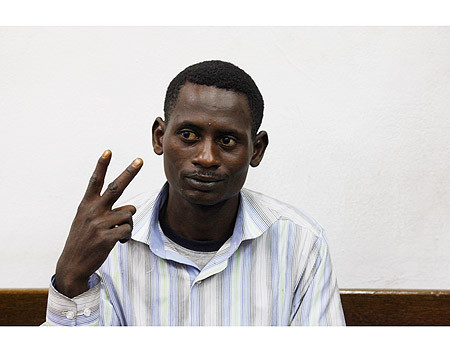 Suleiman Abdul-Adham gestures the V-sign