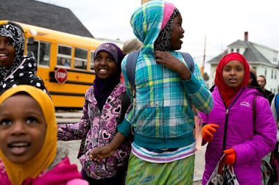 girls at bus stop