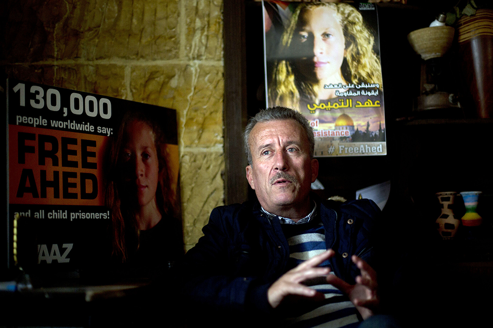 Bassem Tamini and pix of daughter Ahed