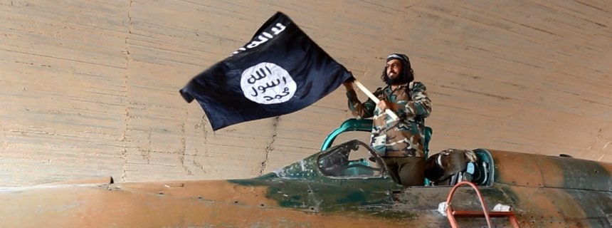 man with ISIS flag