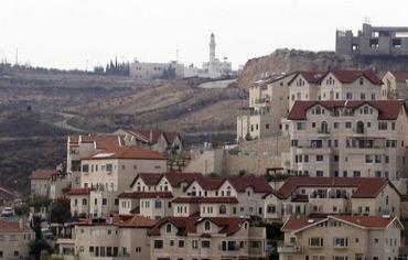 Mosque  behind houses in settlement of Efrat, December 2011.
(Photo: Reuters/Baz Ratner)